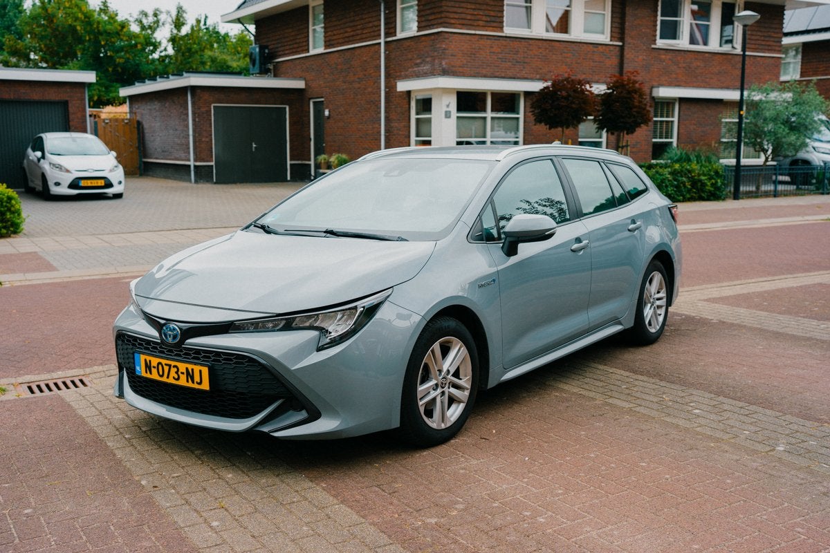 Toyota Corolla TS 1.8 Hybrid 122pk CVT 2021 Grijs, Auto's, Toyota, 1345 kg, 450 kg, 750 kg, Stationwagon