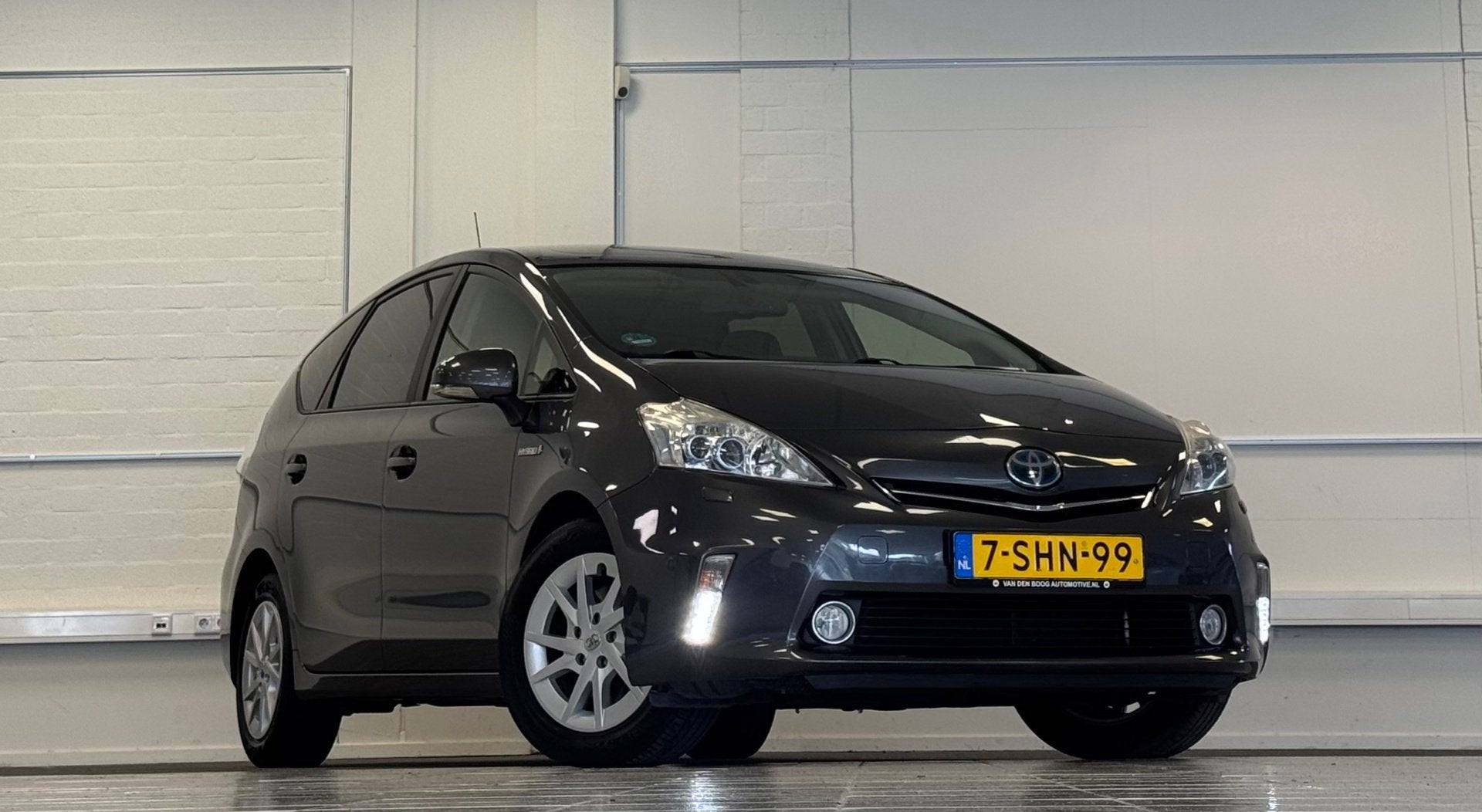 Toyota Prius Wagon 1.8 Dynamic Business 7p 100% onderhouden, Auto's, Euro 5, Gebruikt, Zwart, 4 cilinders