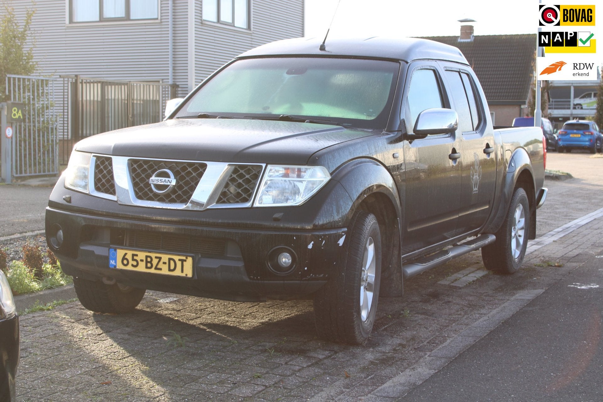 Nissan Navara 2.5 dCi LE Double Cab, APK 03-2027, Olie verbr, Auto's, Stof, Gebruikt, Zwart, 4 cilinders