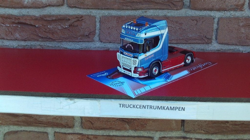 Tekno  Scania  R - Serie  van  VG  Trans.