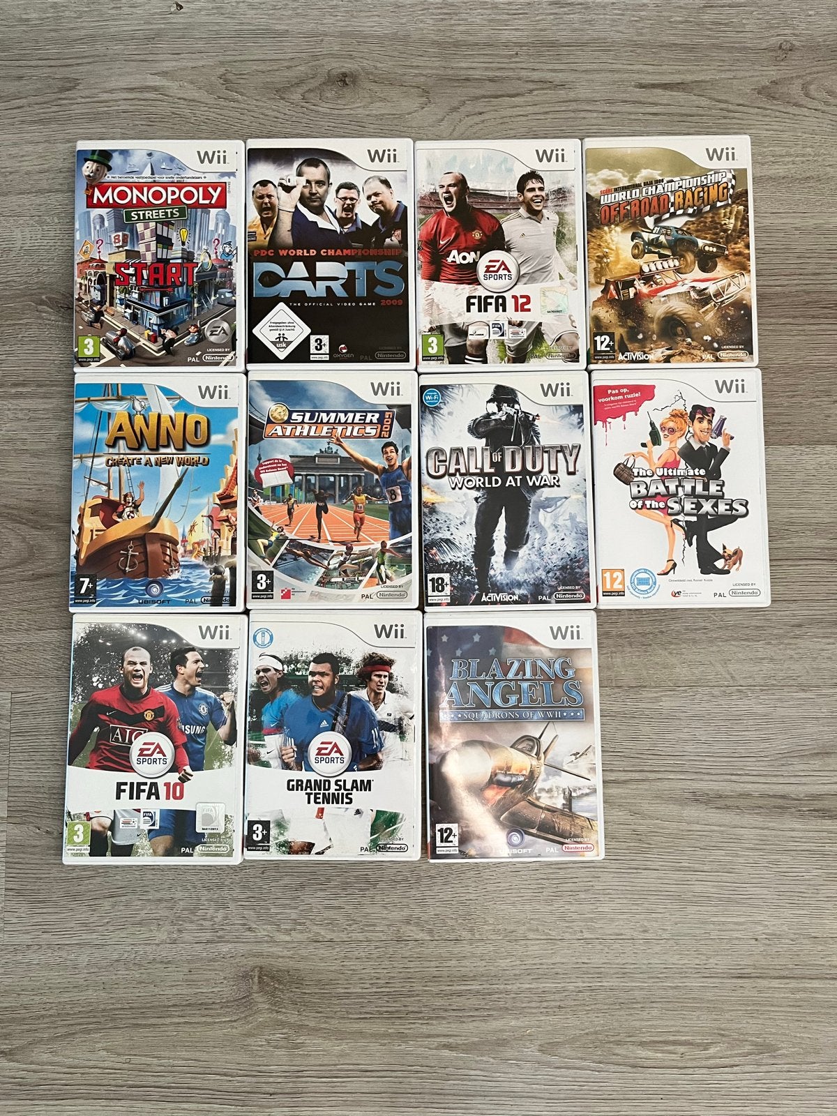 Bundel van 11 Wii games: FIFA, Call of Duty, Monopoly en mee, Spelcomputers en Games, Gebruikt, Vanaf 18 jaar, Eén computer, Ophalen of Verzenden