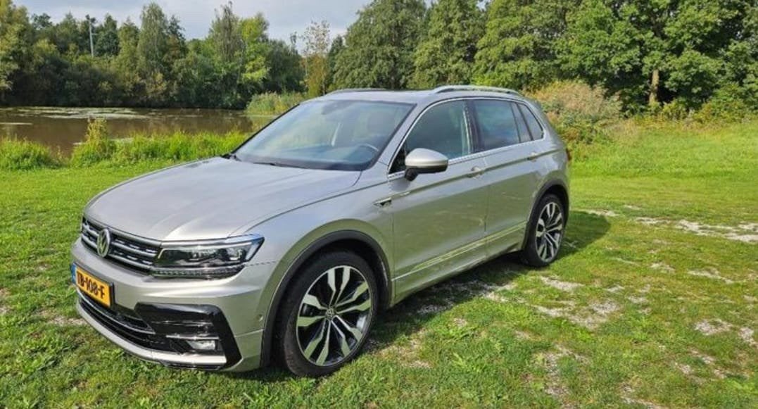 Volkswagen Tiguan 1.4 TSI 92KW 2018 Grijs, Auto's, Voorwielaandrijving, Dealer onderhouden, 750 kg, 4 cilinders