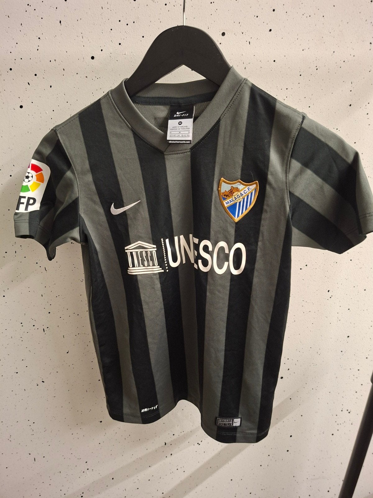 Voetbalshirt Málaga CF Maat M (137-147 cm), Maat M, Ophalen of Verzenden, Gebruikt, Shirt