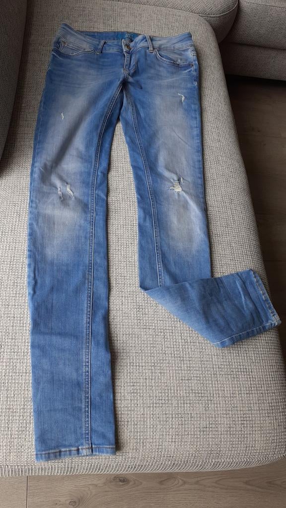 Blauwe spijkerbroek Anti  Jeans maat 28, Ophalen of Verzenden