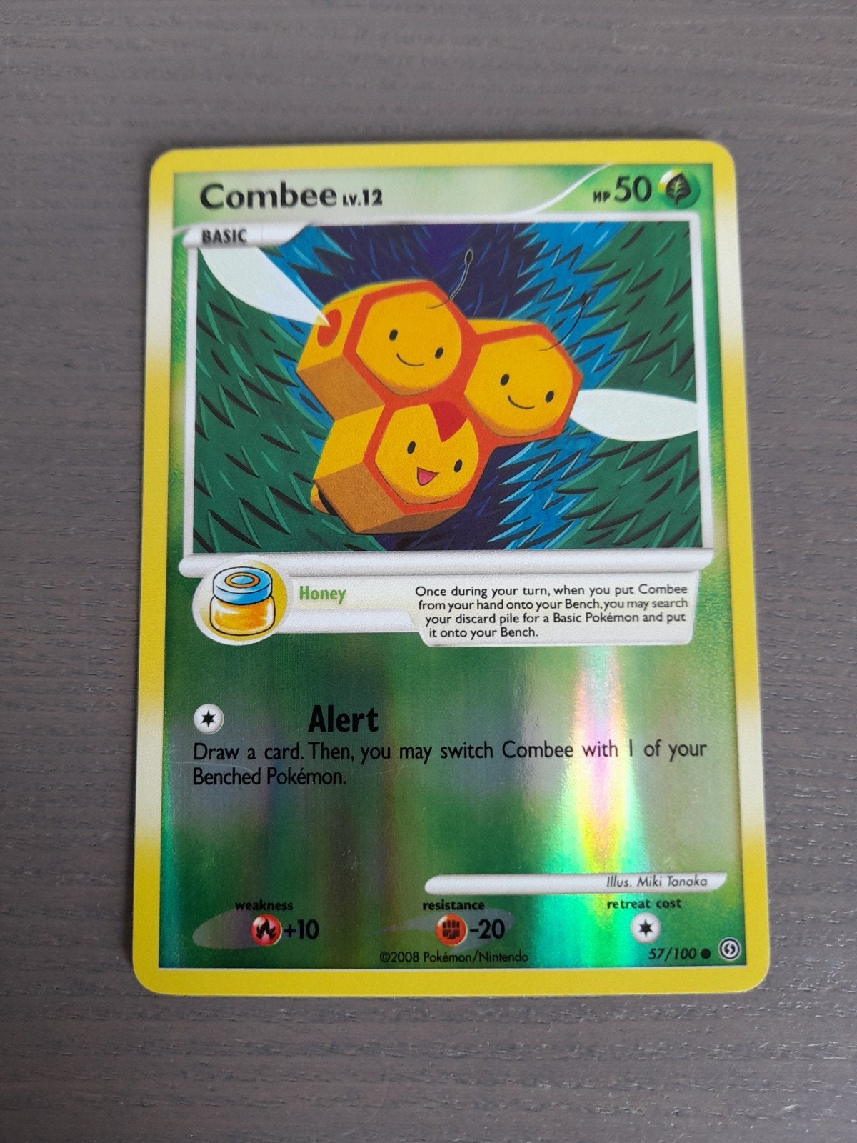 Stormfront 57/100 combee reverse, Ophalen of Verzenden, Gebruikt, Losse kaart, Foil