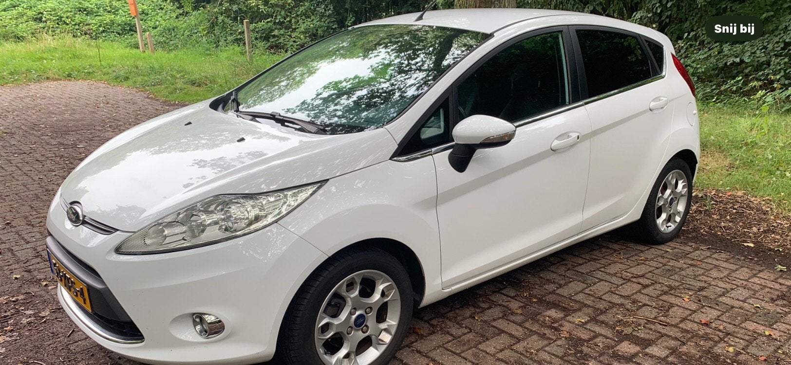 Ford Fiesta 1.25 champion, 5 deurs 2012, wit.  1e eigenaar, Voorwielaandrijving, Stof, Wit, Handgeschakeld