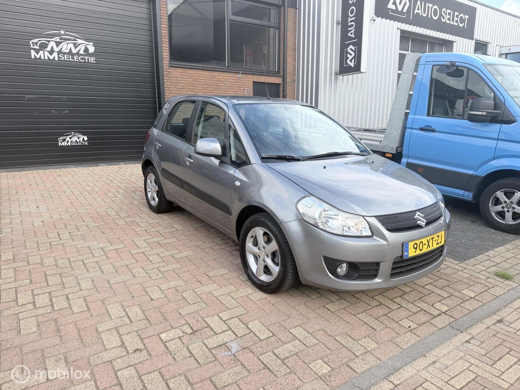 Suzuki SX4 1.6 Exclusive 1ste Eigenaar NAP Airco, Auto's, Voorwielaandrijving, 15 km/l, Gebruikt, 4 cilinders