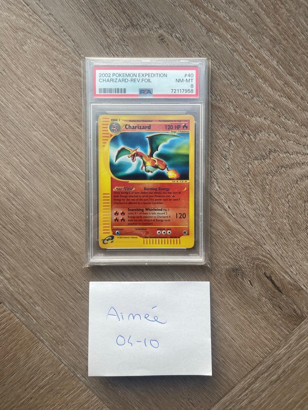 Charizard 40/165 Expedition Reverse Holo PSA 8, Ophalen of Verzenden, Zo goed als nieuw, Losse kaart, Foil