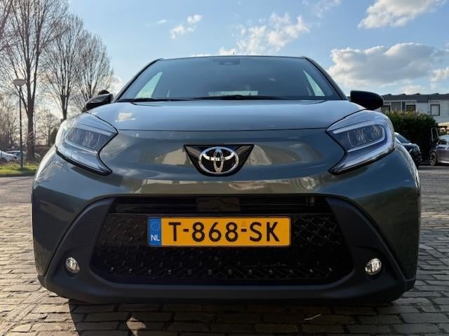 Toyota Aygo X 1.0 Vvt-i MT 72pk 2023 Groen, Auto's, Stof, Origineel Nederlands, Aygo X, Particulier