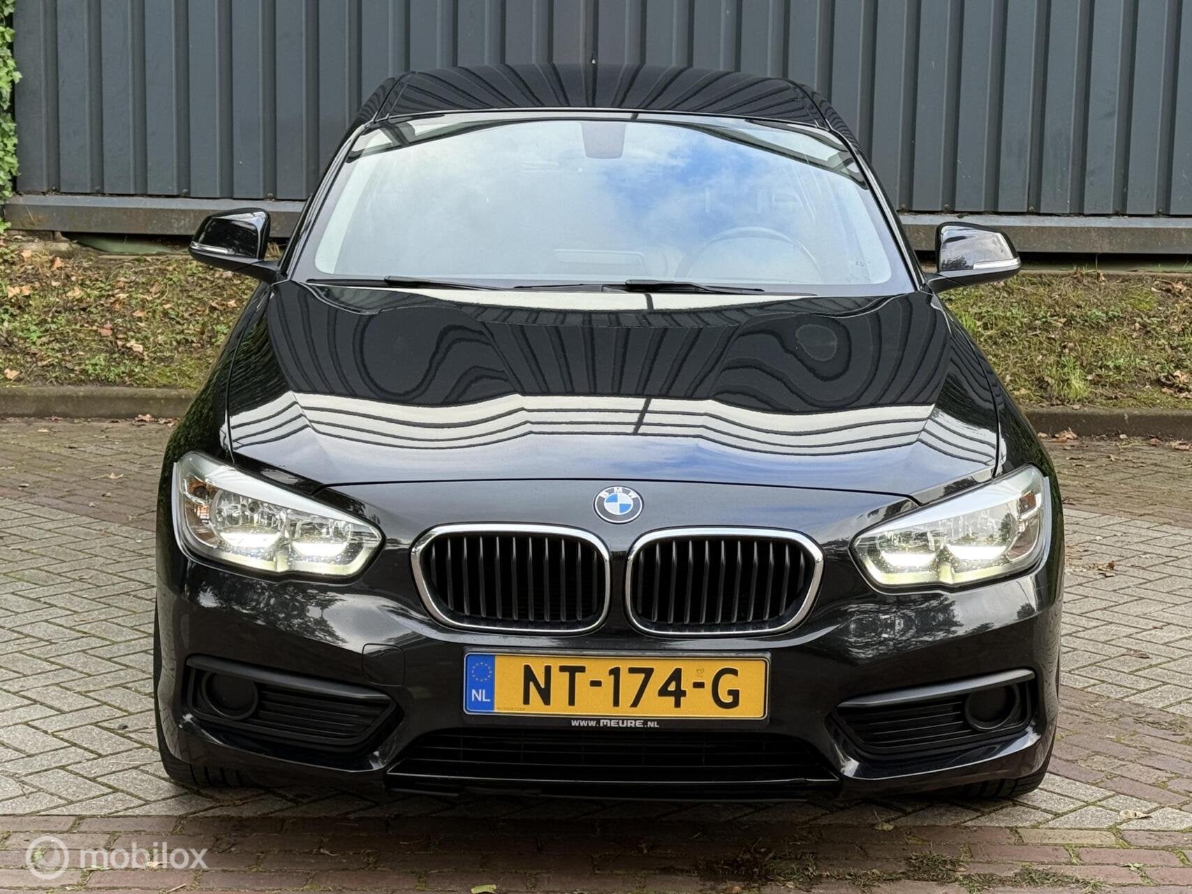 BMW 1-serie 116d Sport |Automaat|Stoelverw|LED|Pdc|Boekjes, Auto's, Gebruikt, 116 pk, Zwart, Bedrijf