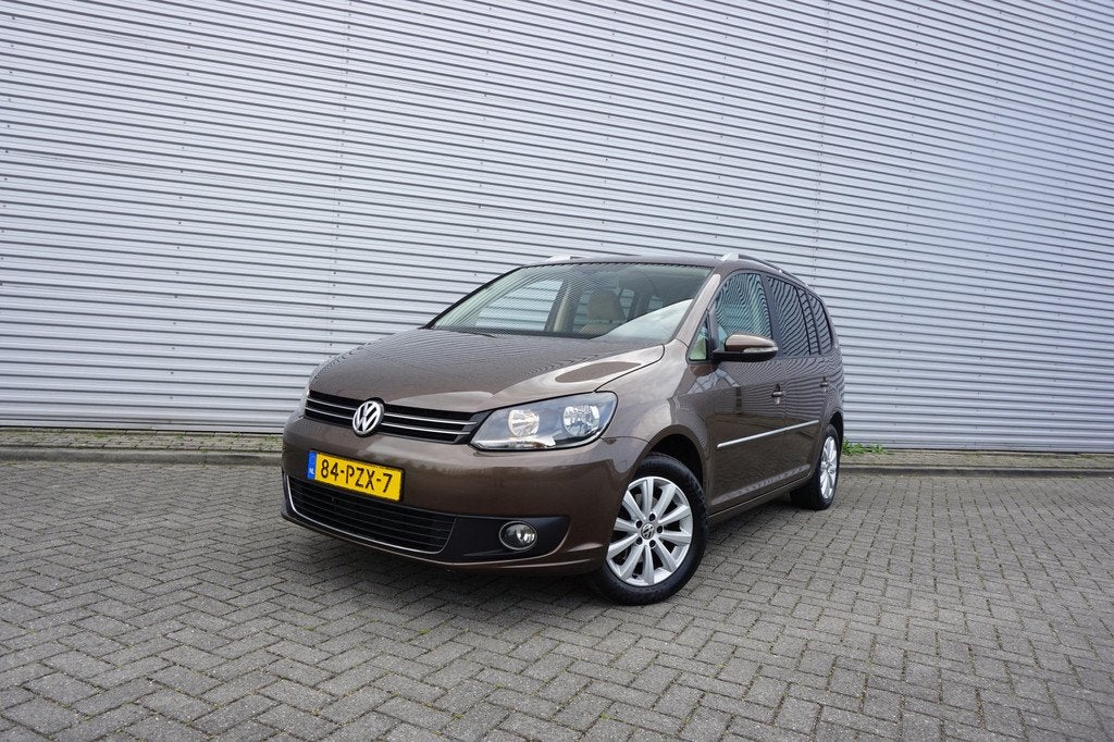 Volkswagen Touran 1.2 TSI Highline BlueMotion Airco / Navi /, Auto's, Volkswagen, Euro 5, Gebruikt, 4 cilinders, Bruin