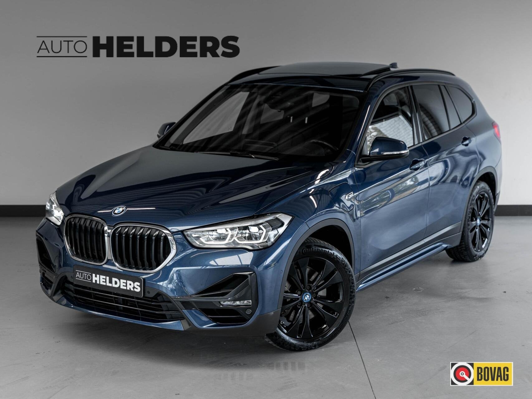 BMW X1 xDrive25e High Executive Pano HuD Lane 18', Auto's, Gebruikt, Blauw, Vierwielaandrijving, Hybride Elektrisch/Benzine