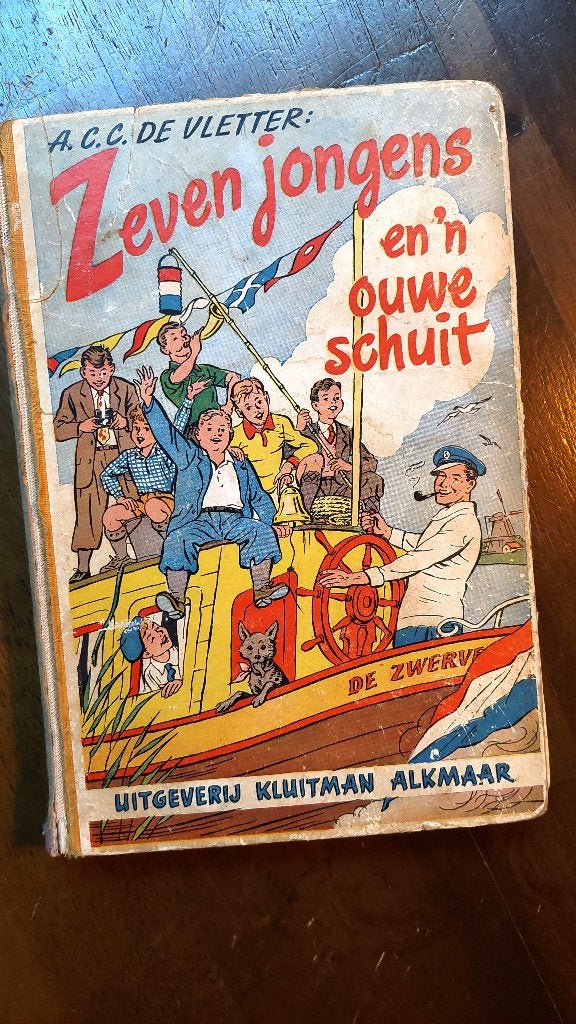 Zeven jongens en een oude schuit, Boeken, Gelezen, A.C.C. de Vletter, Ophalen of Verzenden, Fictie