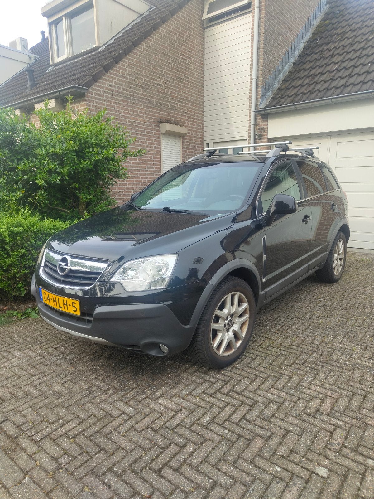 Opel Antara 2.4 16v 4x4 2009 Zwart apk maart 2027, Stof, Zwart, 4 cilinders, Zwart