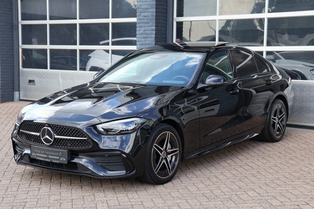 Mercedes-benz C-KLASSE C 300 E  AMG-line panoramadak, Auto's, Met garantie (alle), 167 km/l, Zwart, Sedan