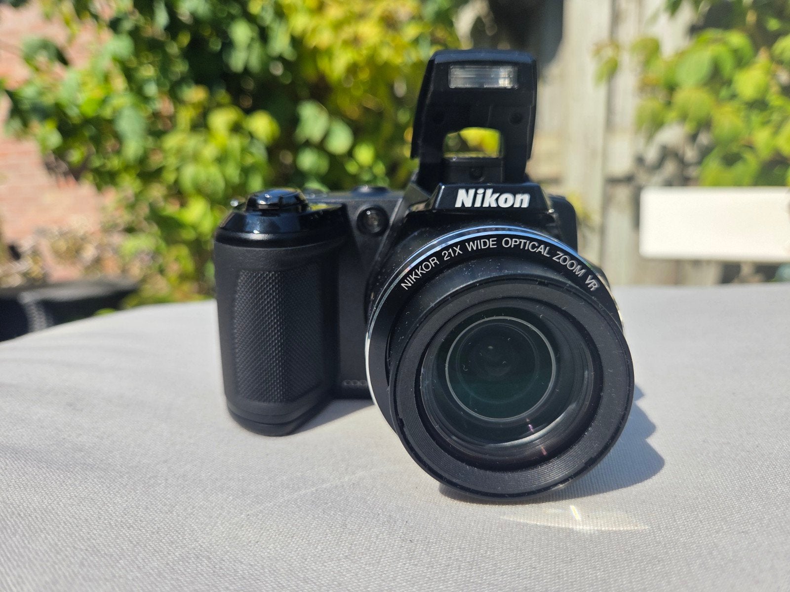 Nikon Coolpix L120 Bridgecamera, Audio, Tv en Foto, Fotocamera's Digitaal, Gebruikt, Ophalen of Verzenden, Lensdop, Nikon