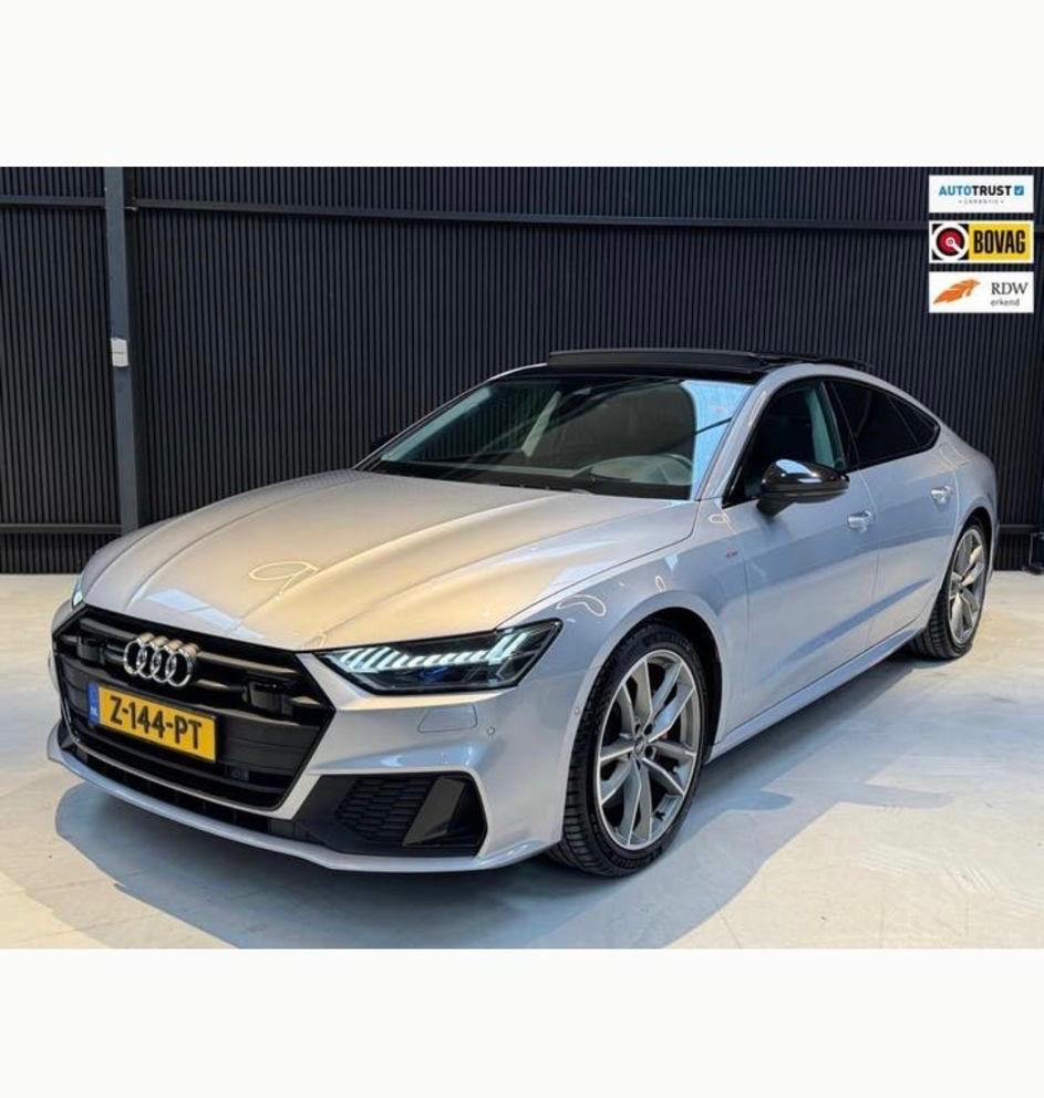 Audi A7 55 Tfsi e Quattro 367pk S Tronic 2021 Grijs, Auto's, Audi, Stoelverwarming, Zwart, Vierwielaandrijving, 129 €/maand