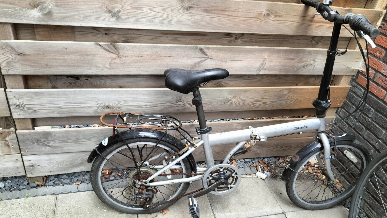 Gratis opvouwbare fiets met defect, Ophalen