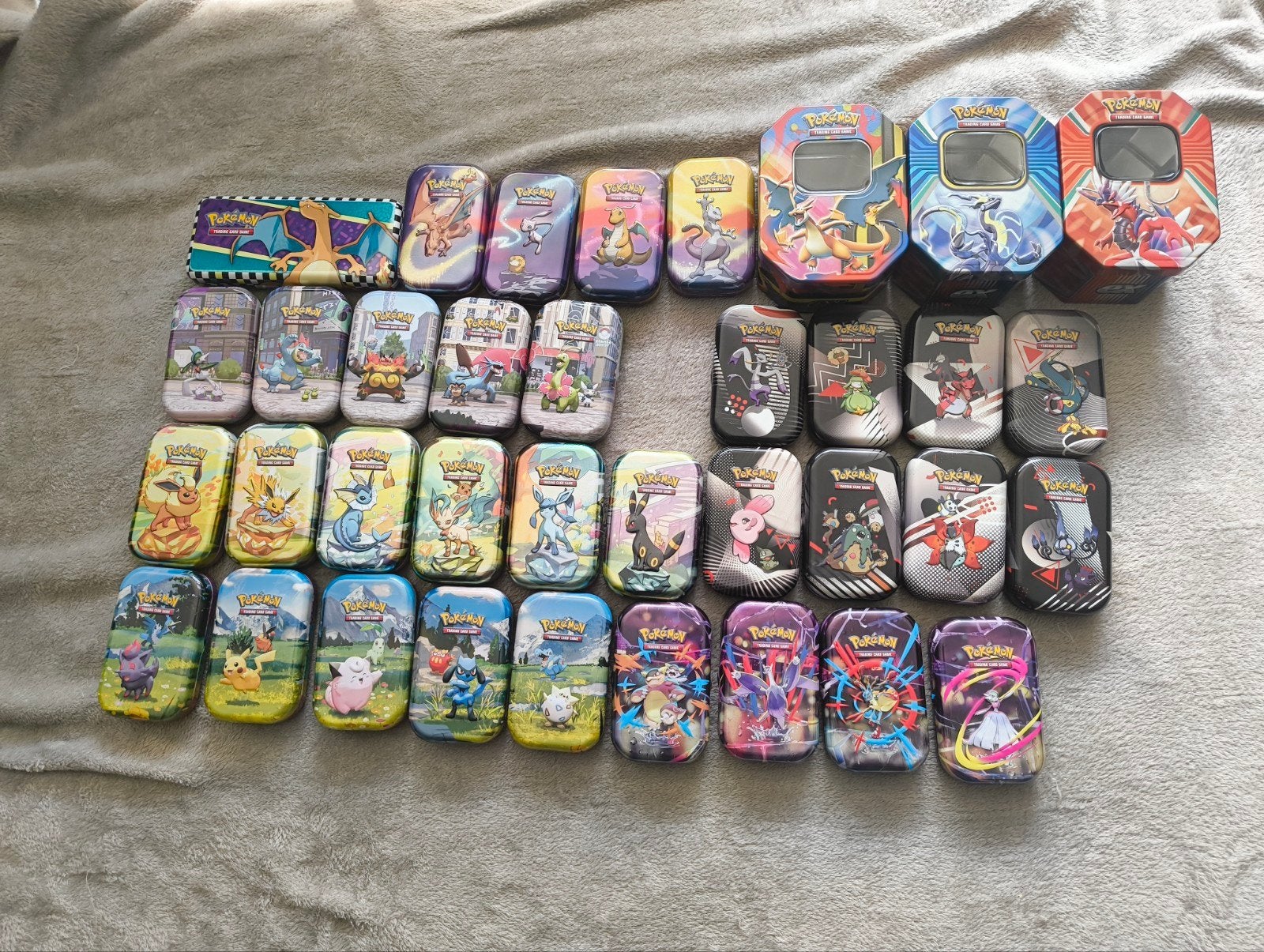 Pokemon Tins, Hobby en Vrije tijd, Verzamelkaartspellen | Pokémon, Ophalen of Verzenden, Zo goed als nieuw, Overige typen