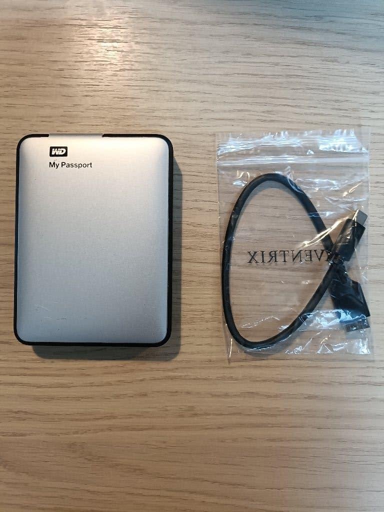 WD My Passport Externe HDD 1TB, Computers en Software, Verzenden, HDD, 5601 Great America Parkway, San Jose, CA 95134, USA, Zo goed als nieuw