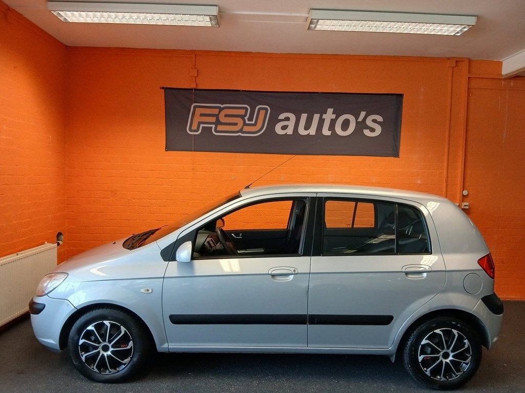 Hyundai Getz 1.4 / 5 DEURS / ACTIVE COOL / AIRCO!, Voorwielaandrijving, Zwart, 4 cilinders, Origineel Nederlands