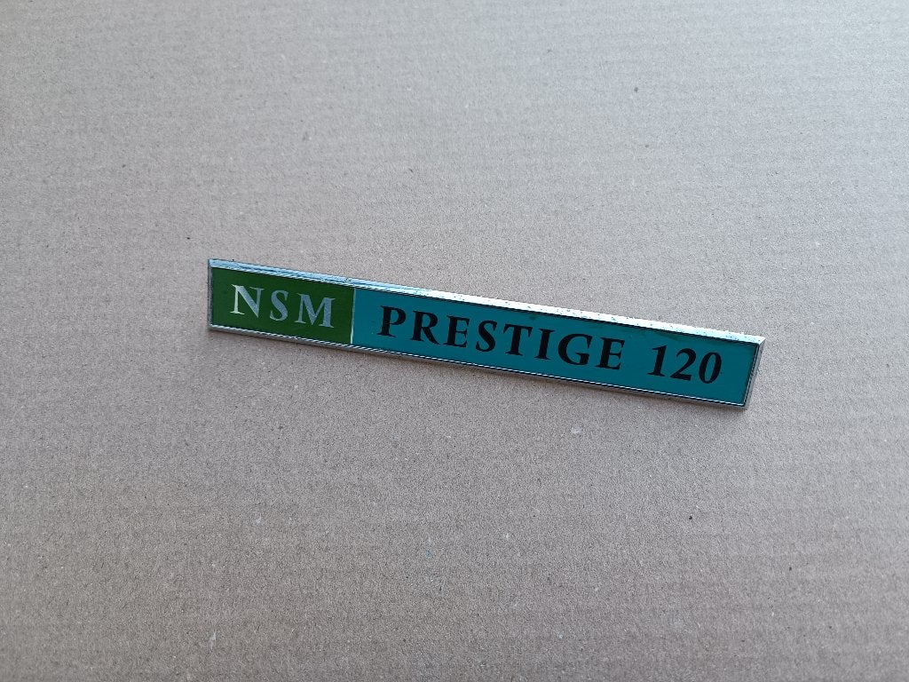 Embleem NSM Prestige 120 (1971) jukebox, Verzenden, Gebruikt, 1950 tot 1960, Seeburg