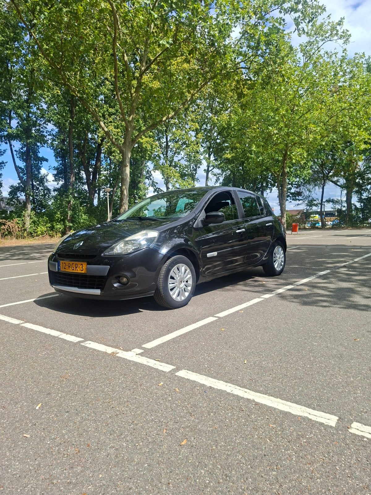 Renault Clio 1.2 TCE 5-DRS 2011 Zwart, Auto's, Voorwielaandrijving, Zwart, 4 cilinders, 100 pk