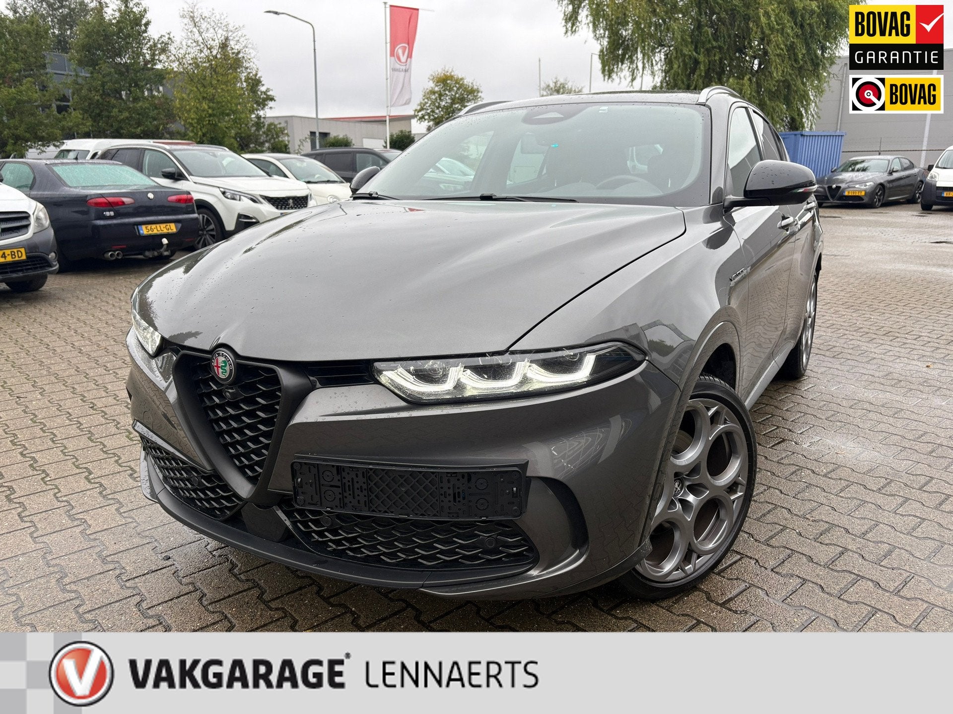 Alfa Romeo Tonale 1.3T PHEV Veloce 280PK (RIJKLAAR BOVAG), Auto's, Automaat, 12 maanden, Gebruikt, Zwart