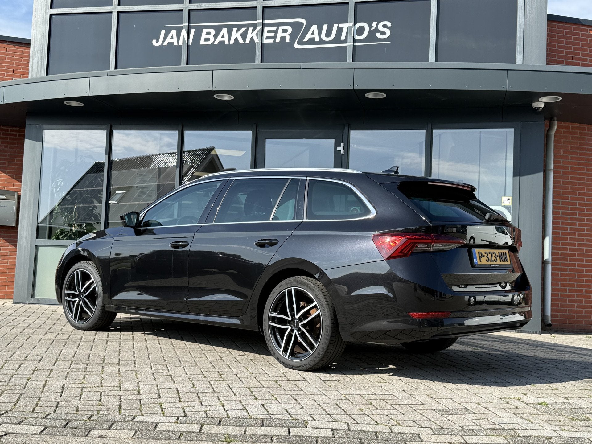 Skoda Octavia Combi 1.0 e-TSI Business Edition Plus  Auto, Auto's, Stof, Gebruikt, Zwart, 1253 kg