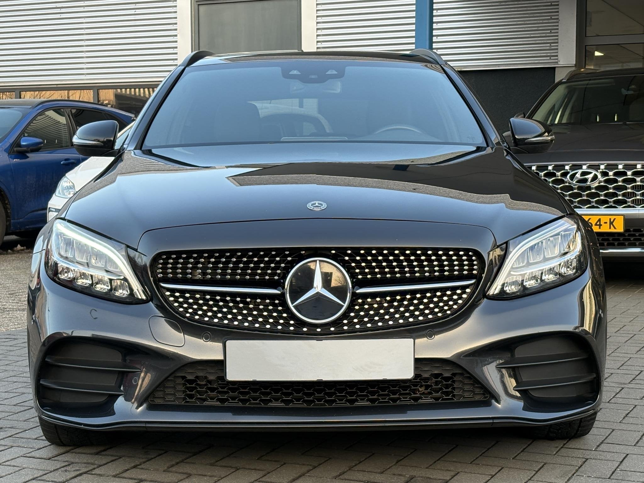 Mercedes-Benz C-klasse Estate 300e T AMG Line 320pk PHEV | S, Auto's, Dealer onderhouden, 320 pk, Leder en Stof, Zwart