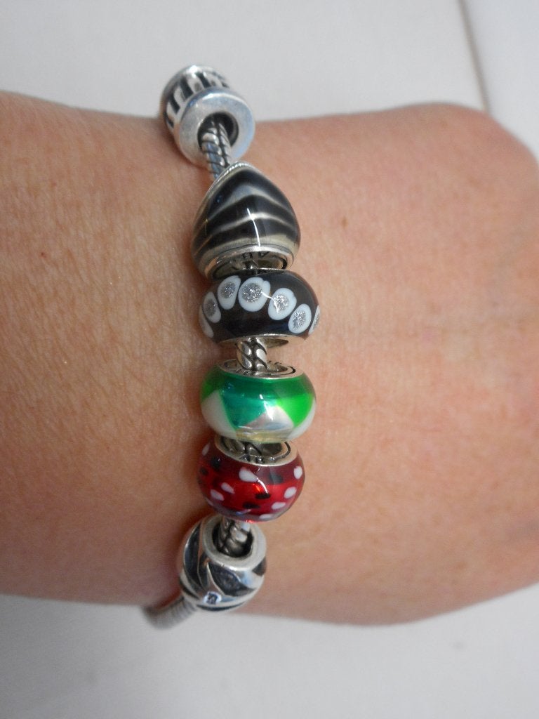 Zilveren Amora armband met 6 bedels nr.345, Verzenden, Zo goed als nieuw, Met bedels of kralen, Zilver