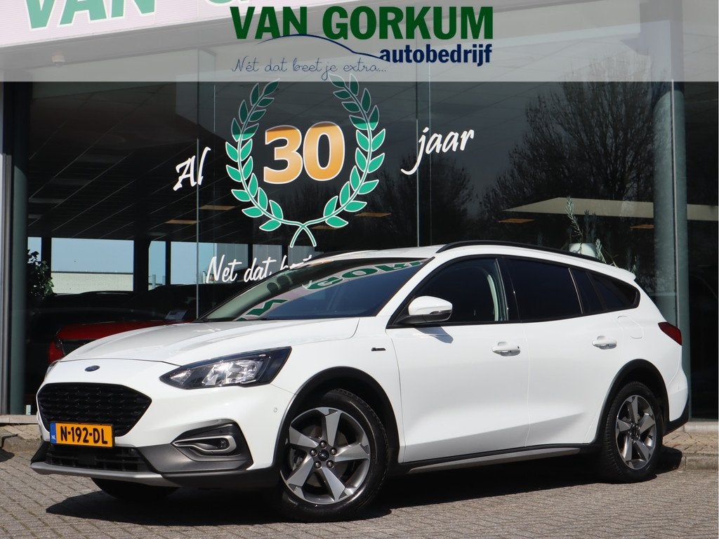 Ford FOCUS Wagon 1.0 EcoBoost Active Business Navi / Trekh /, Auto's, Stof, Gebruikt, Euro 6, Wit