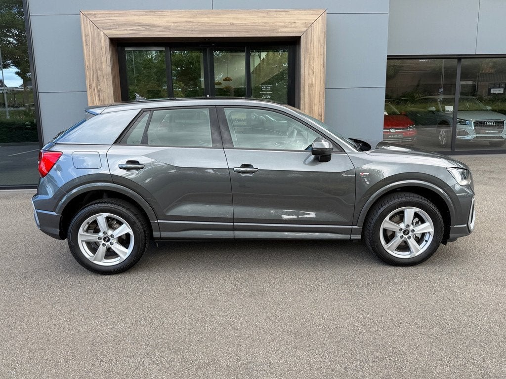 Audi Q2 35 TFSI 150pk S-tronic S-line | Camera | Carplay | A, Auto's, Audi, 12 maanden, Stof, 4 cilinders, Automatische klimaatregeling