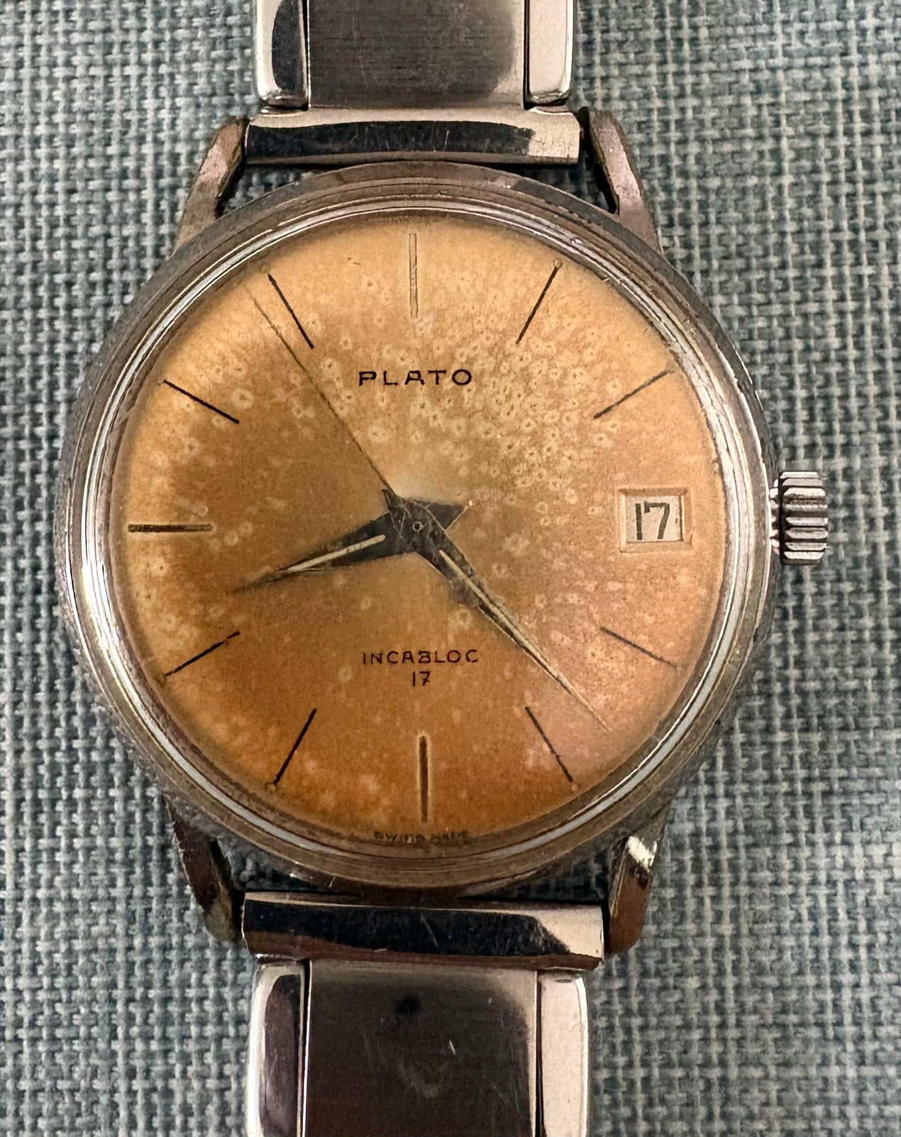 Plato herenhorloge met  Zwitsers mechanisch uurwerk, Ophalen of Verzenden, Staal, Overige merken, 1960 of later