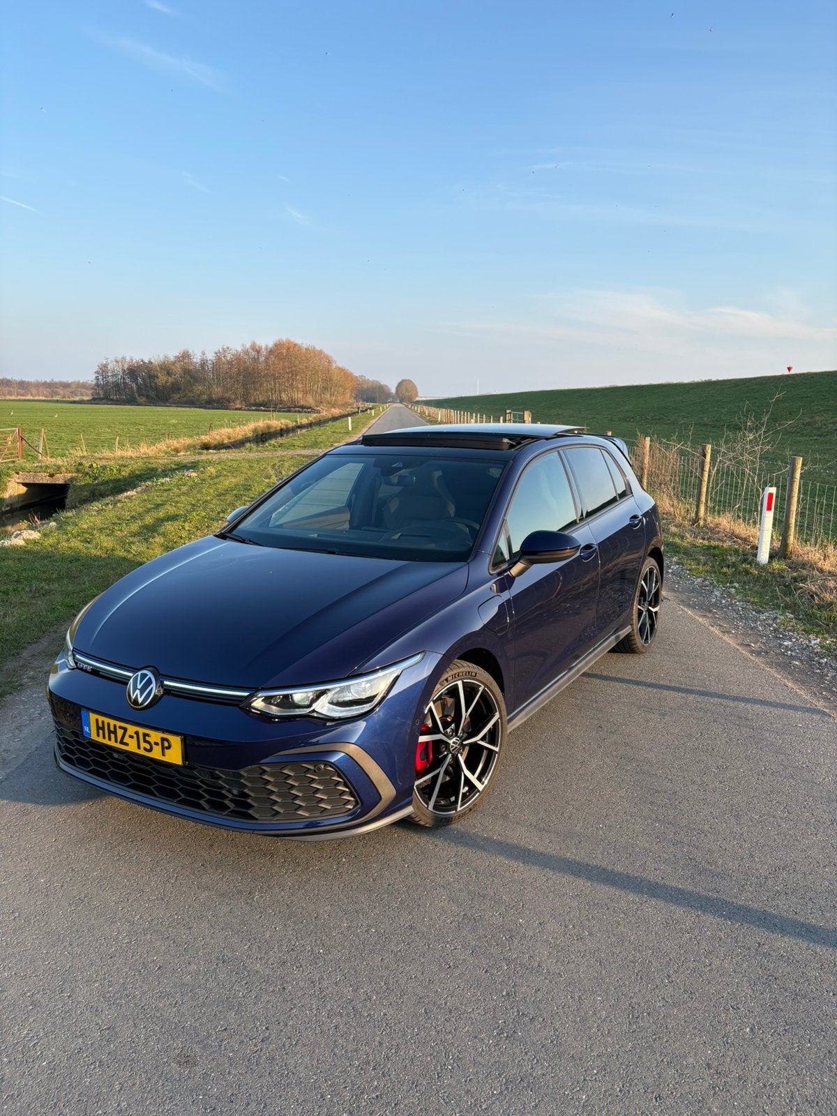 Volkswagen Golf 245pk DSG 2022 Blauw Pano IQ Trekhaak HUD, Stof, 4 cilinders, Blauw, Plug-in hybride