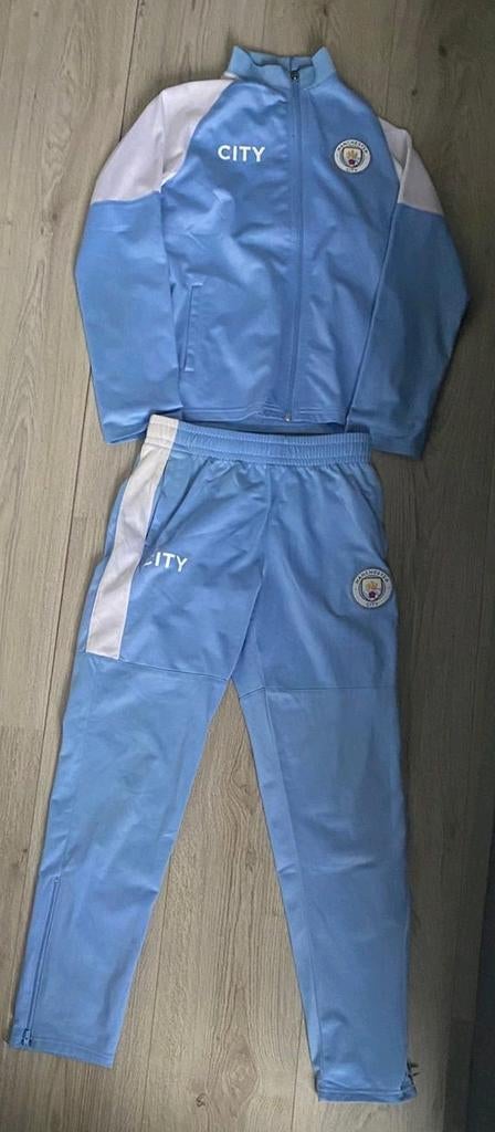 Trainingspak Manchester City maat 152, Ophalen of Verzenden, Zo goed als nieuw, Jongen of Meisje, Sport- of Zwemkleding