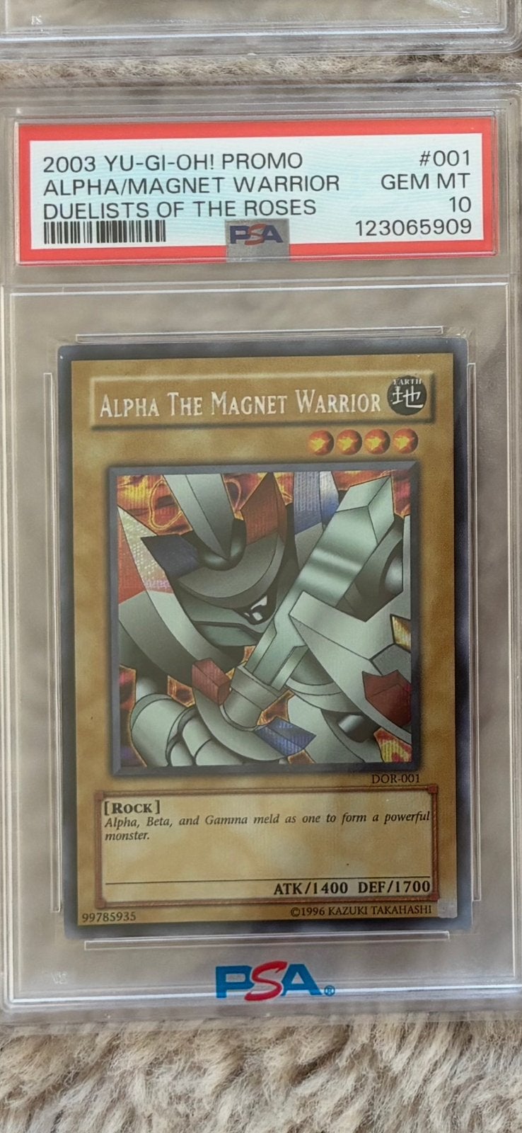 Alpha the magnet warrior PSA 10, Hobby en Vrije tijd, Ophalen of Verzenden, Nieuw