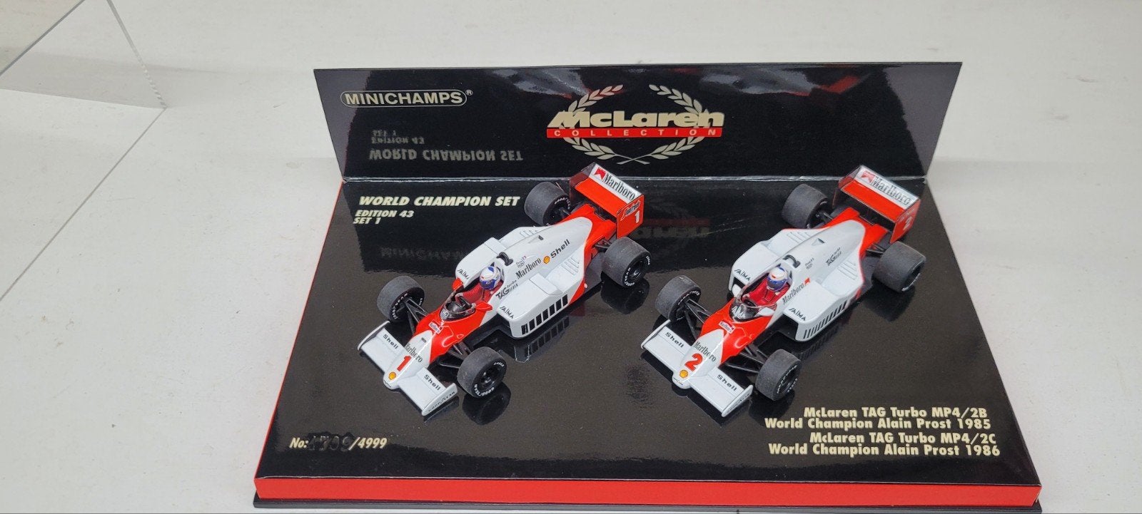 Minichamps McLaren MP4/2B en MP4/2C Alain Prost WC 1985/1986, Ophalen of Verzenden, Zo goed als nieuw, Auto, MiniChamps