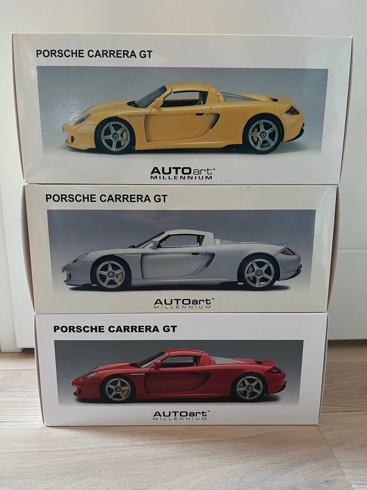 Drie keer Porsche Carrera GT kartonnen doos Autoart 1:18, Ophalen of Verzenden, Zo goed als nieuw, Auto, Autoart