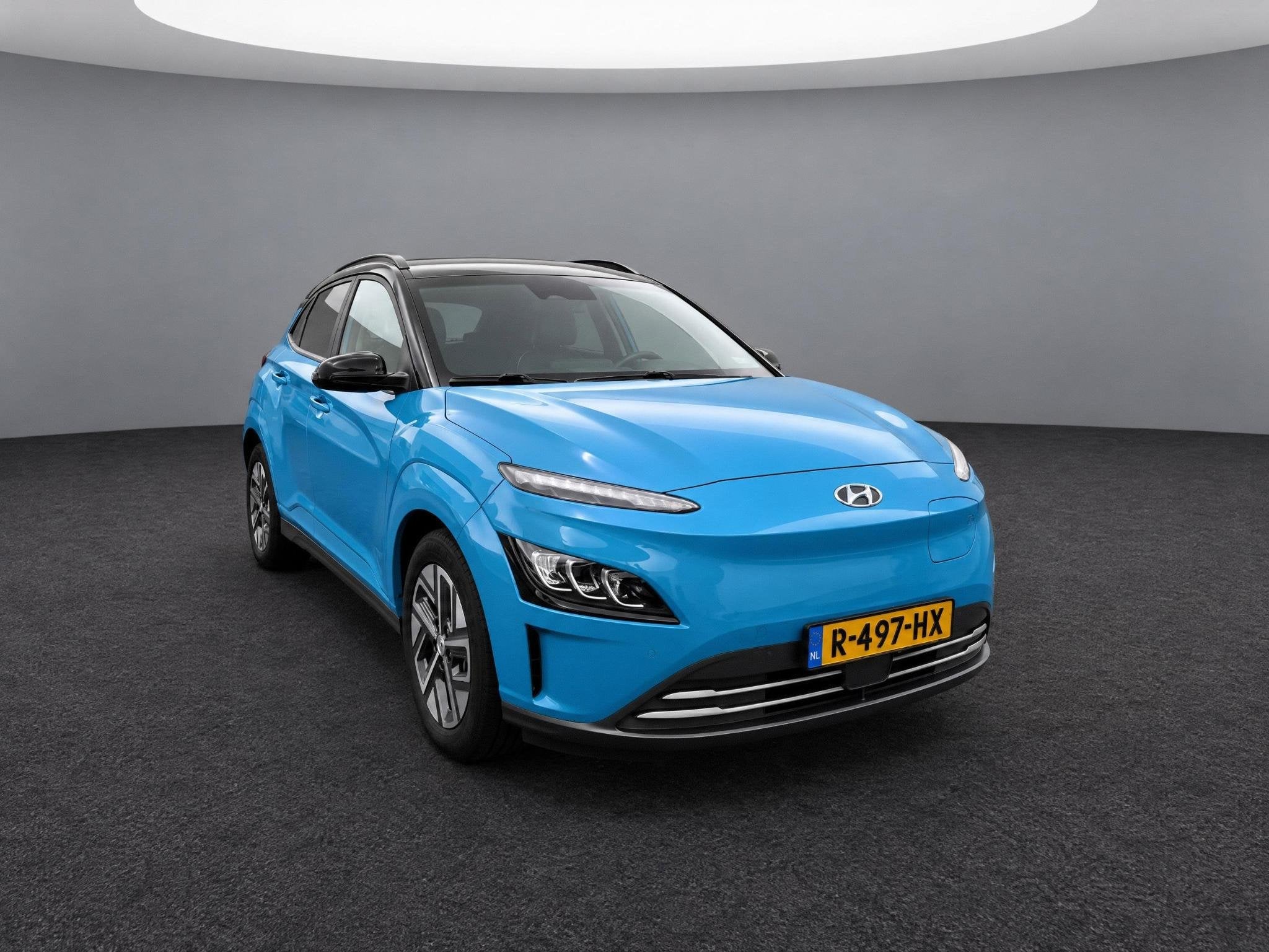 Hyundai Kona EV Fashion 64 kWh | Achteruitrij Camera | Navig, Auto's, Stof, Gebruikt, Blauw, 410 min
