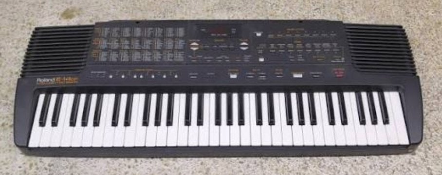 Roland E-14 met handleiding, Muziek en Instrumenten, Roland, Midi-aansluiting, Ophalen of Verzenden, 61 toetsen