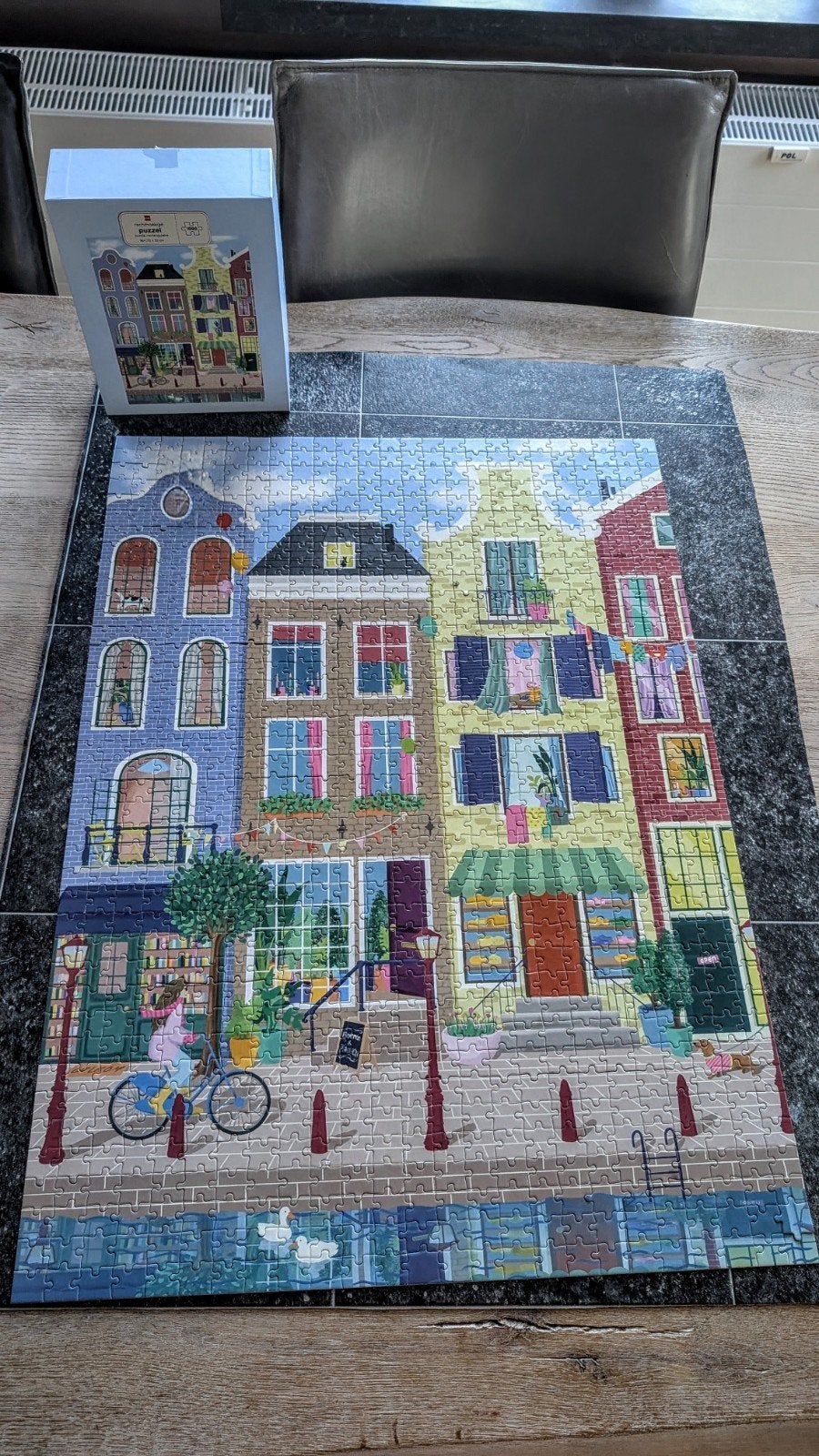 Als nieuw kleurrijke puzzel 1000 stukjes van de HEMA gracht, Ophalen of Verzenden, 500 t/m 1500 stukjes, Zo goed als nieuw, Legpuzzel