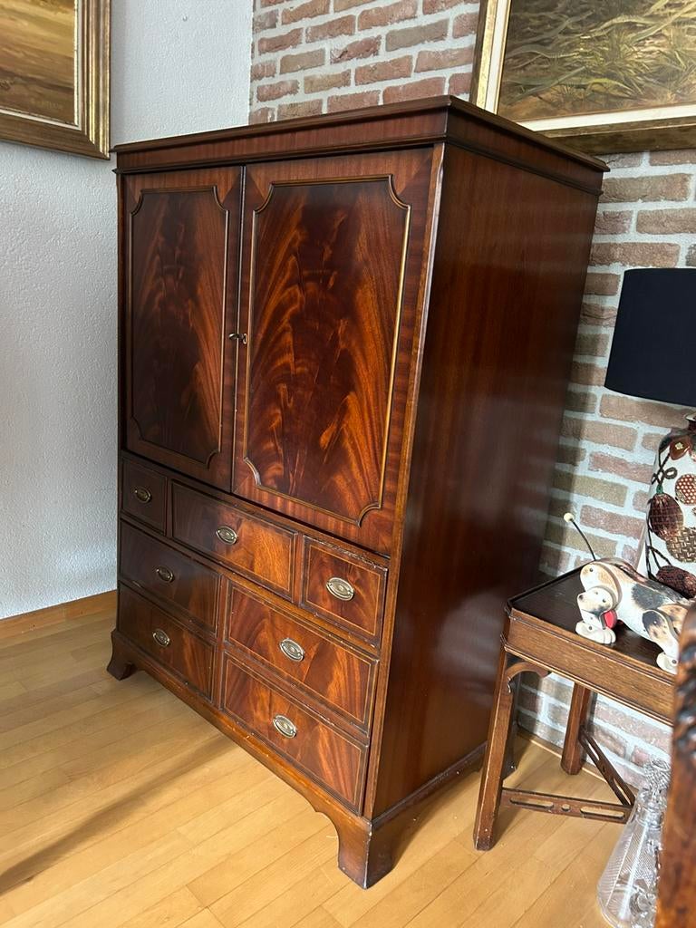 TV kast Mahonie, Ophalen