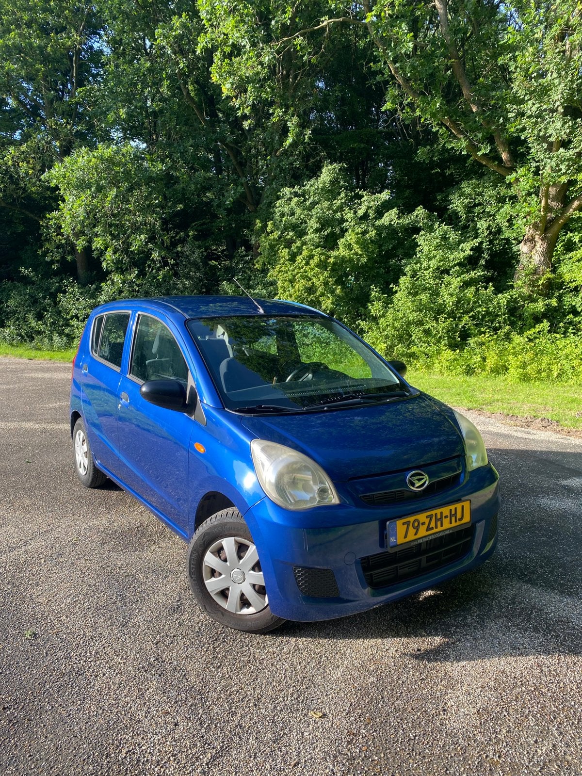 Daihatsu Cuore 1.0 5D 2008 Blauw, Auto's, Daihatsu, Voorwielaandrijving, 600 kg, Zwart, 18 €/maand