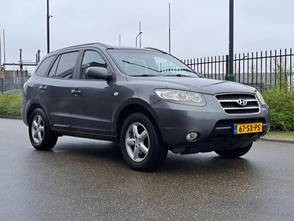 Hyundai Santa Fe 2.7i V6 Dynamic 7p. CLIMA/NAP, Auto's, Voorwielaandrijving, Gebruikt, 2000 kg, Bedrijf