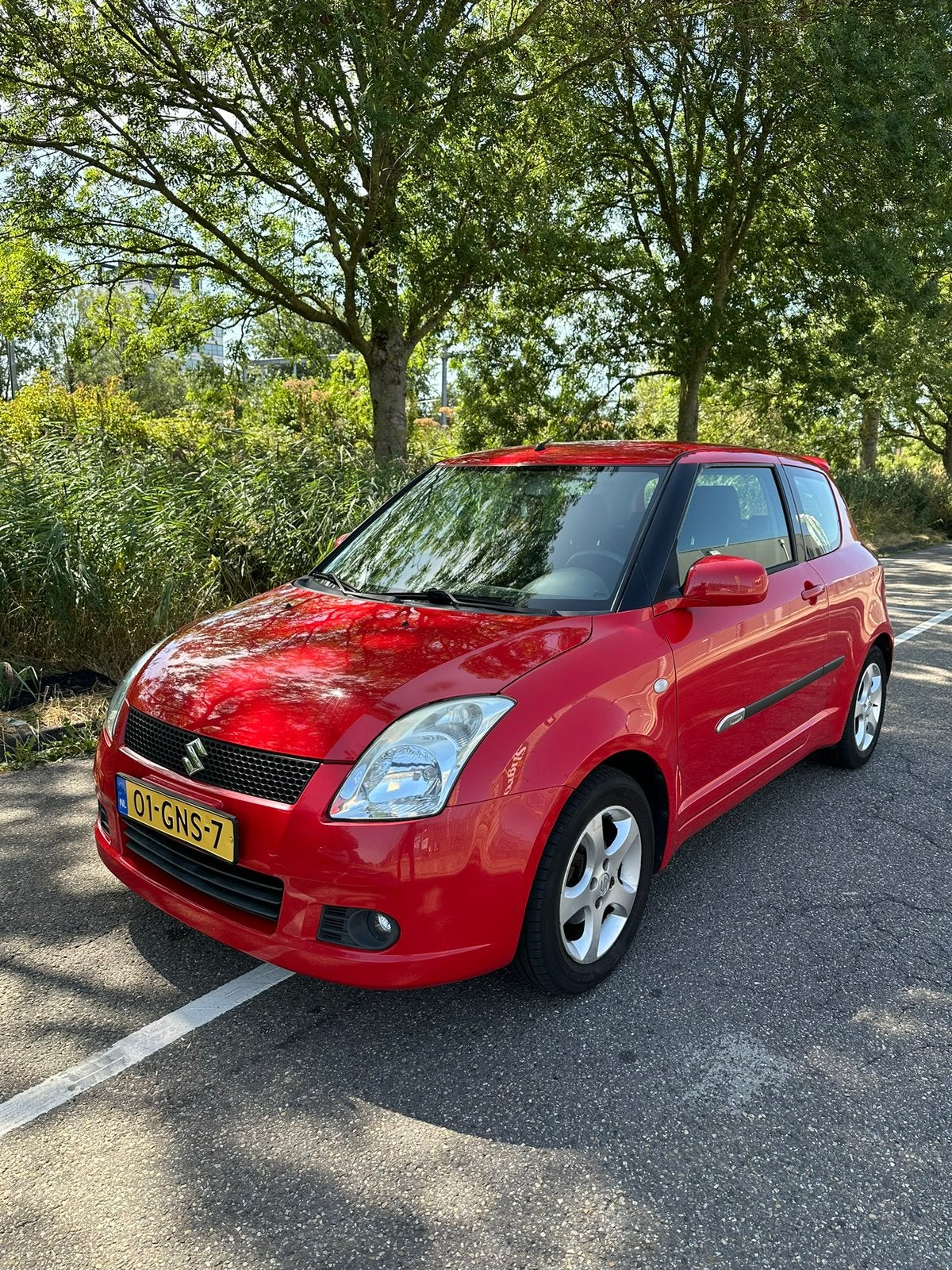 Suzuki Swift 1.3 3D 2008 Rood, Auto's, Suzuki, Stof, Swift, Origineel Nederlands, Handgeschakeld