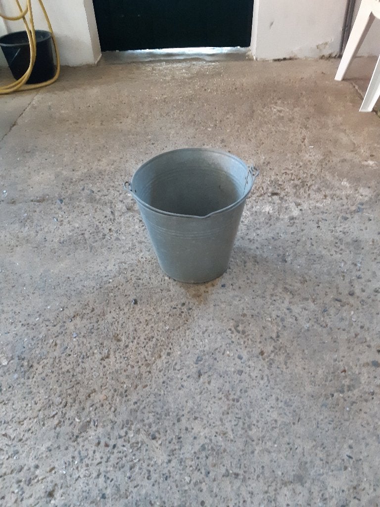 Antieke zinken (melk)emmer, Ophalen