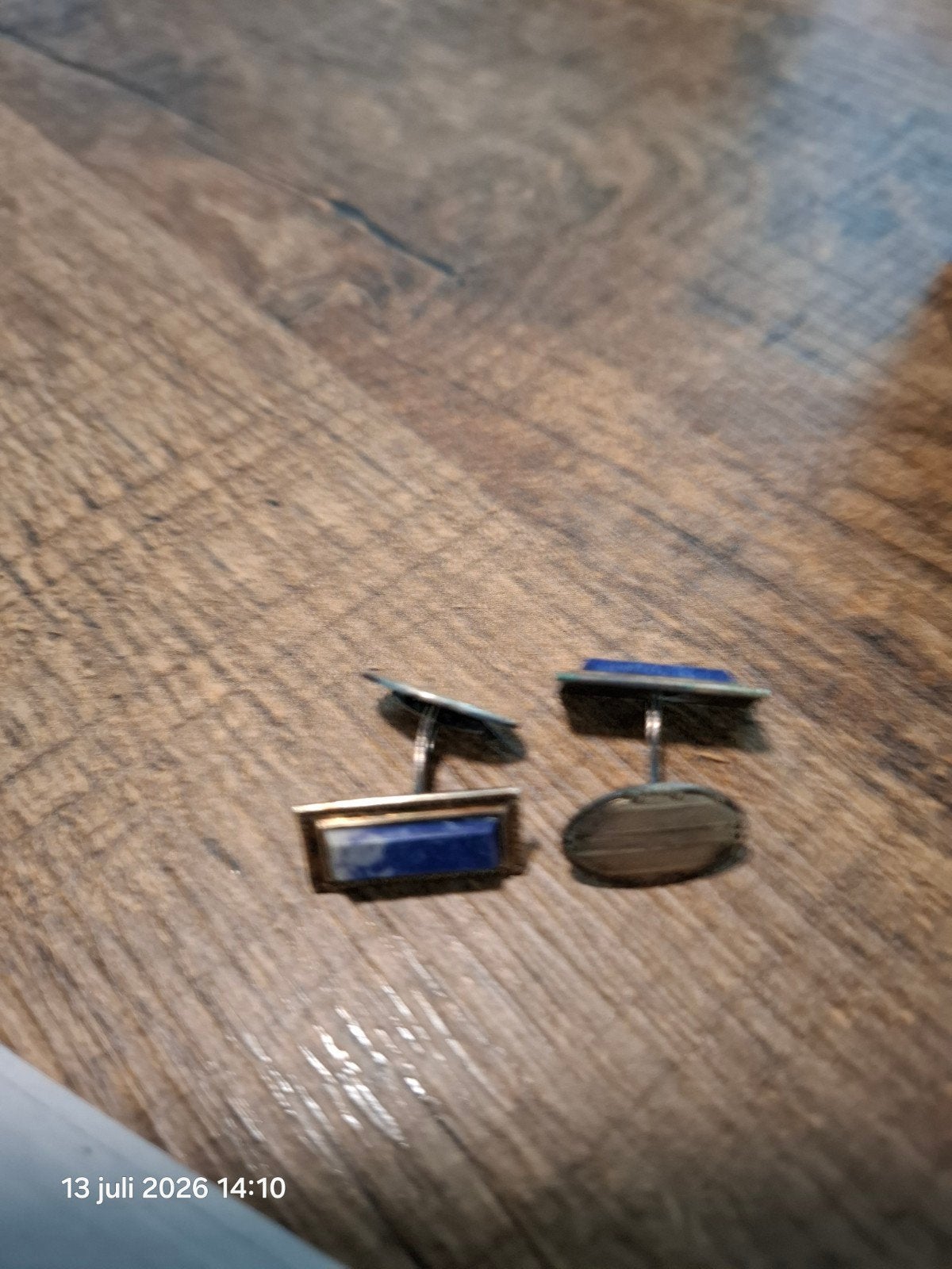 Zilveren manchetknopen met blauwe steen, Ophalen
