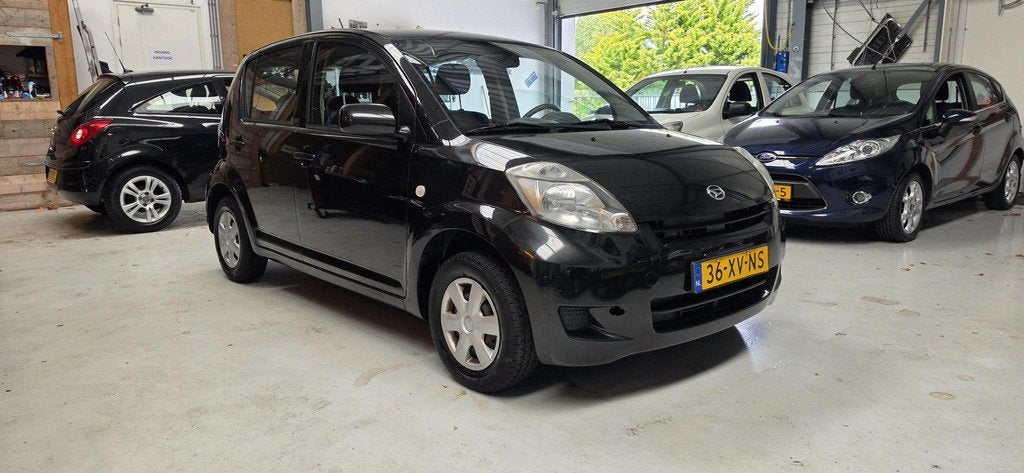 Daihatsu Sirion 2 1.0-12V Premium Bluetooth, el ramen + spie, Auto's, Daihatsu, Voorwielaandrijving, Stof, Gebruikt, Zwart
