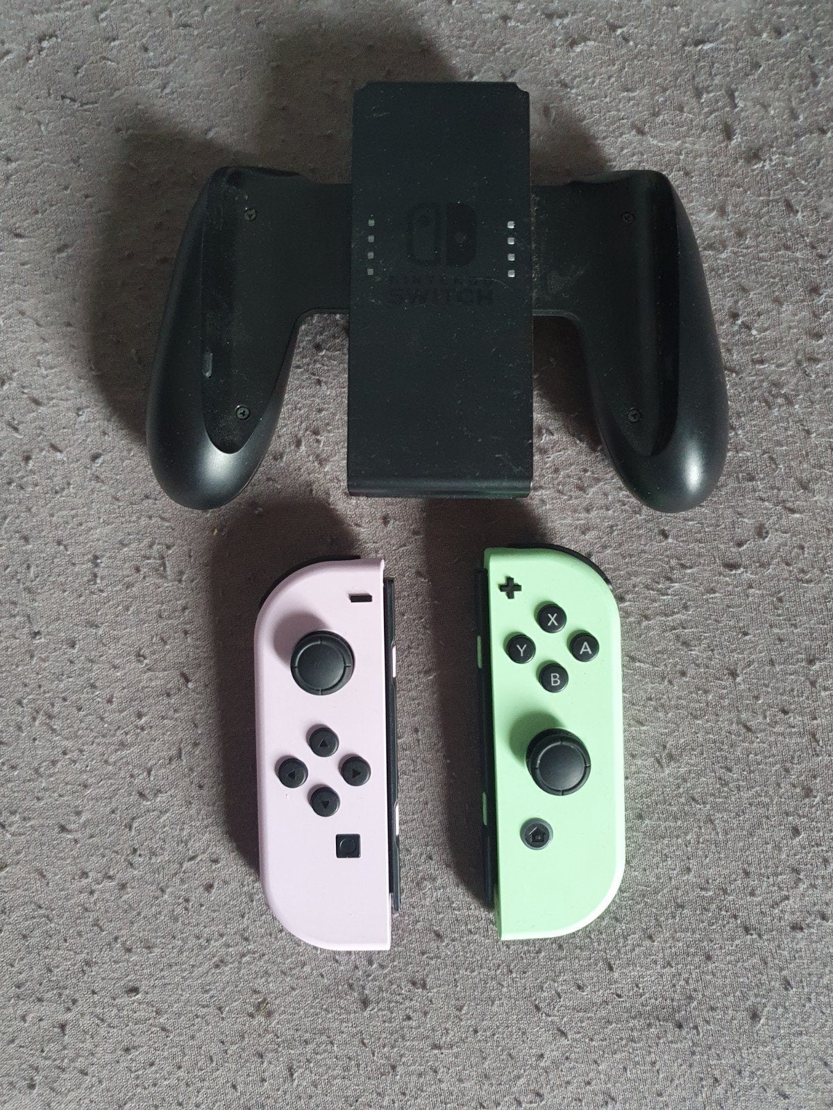 Originele Nintendo Switch Joy-Cons met Griphouder, Overige controllers, Ophalen of Verzenden, Zo goed als nieuw, Draadloos